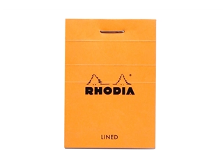 Een Rhodia Schrijfblok N°10 - Oranje - Gelinieerd koop je bij P.W. Akkerman Amsterdam