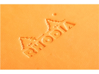 Een Rhodia Webnotebook A5 - Oranje - Gelinieerd koop je bij P.W. Akkerman Amsterdam